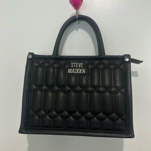 Small black Steve Madden purse, comes with long strap